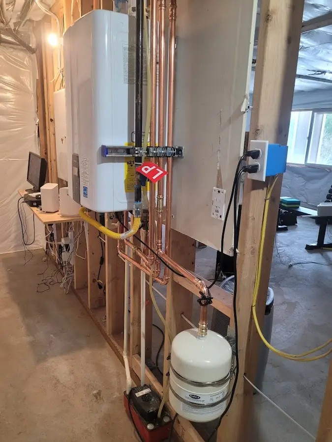 Licensed plumber repairing a kitchen sink in Ketchikan